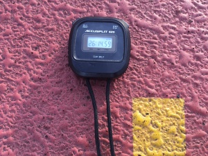 Picture of stopwatch on the running track surface showing the time of the run